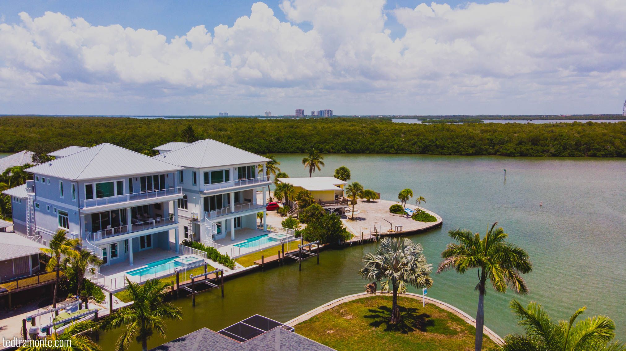 Two condominiums on riverfront property